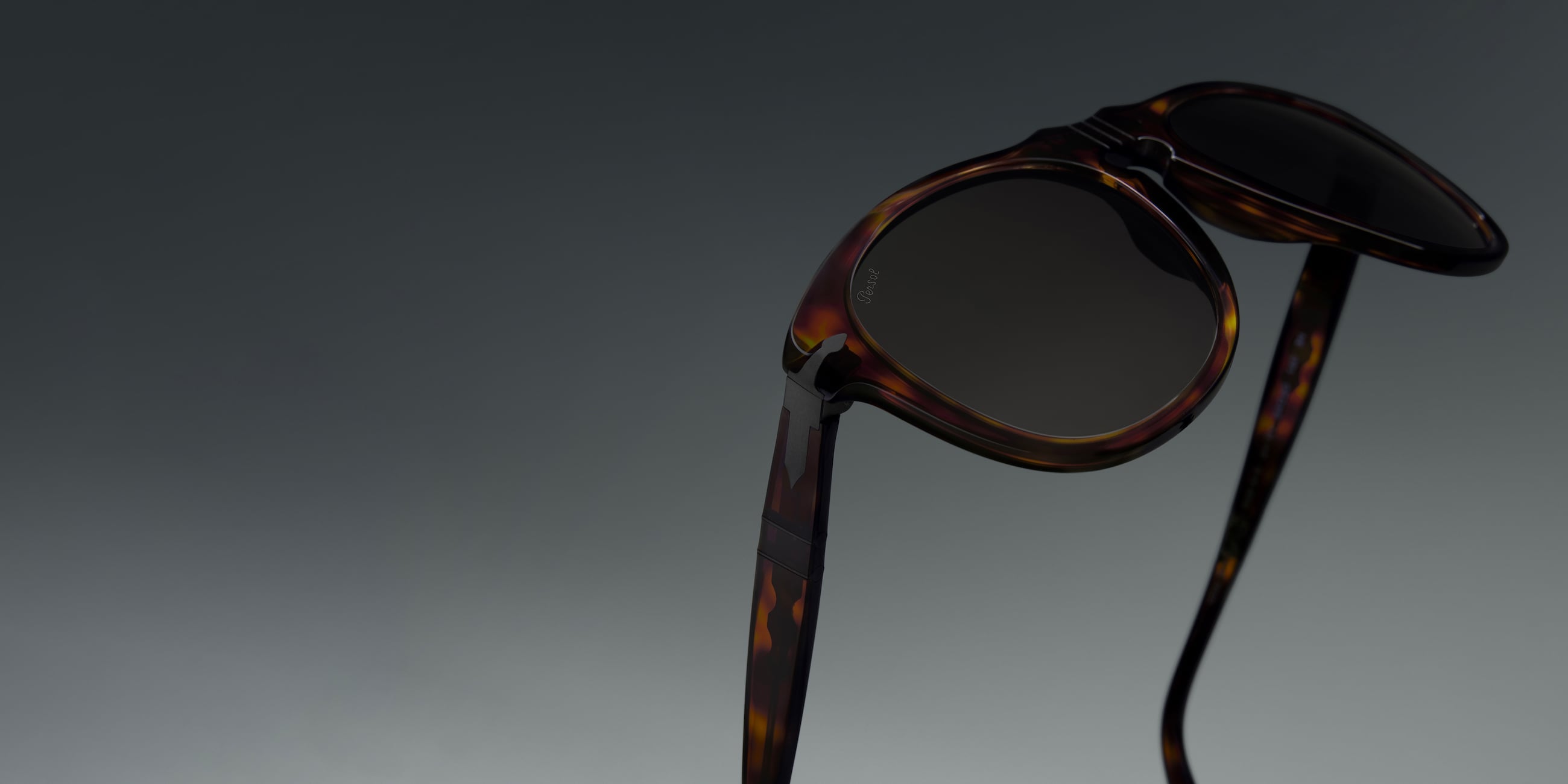 Eyewear care cleaning tips for your PO0649NE - Total Black Arrow with Black Frame and Green Lenses