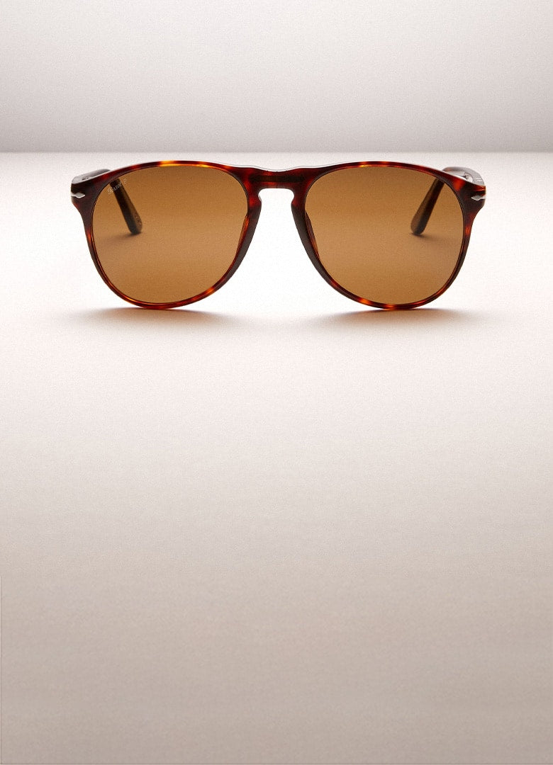 Eyewear care cleaning tips for your PO9649S with Black Frame and Green Lenses